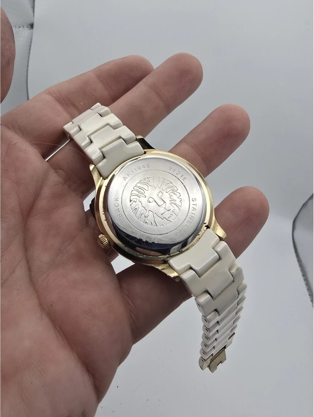 Anne Klein AK/1948 Women’s Quartz Analog Watch Gold Tone Case White Ceramic
